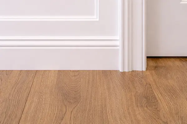 newly painted baseboard and trim